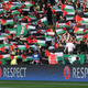 Celtic fans hold up Palestine flags Action Images via Reuters / Russell Cheyne Livepic EDITORIAL USE ONLY. - RTX2LL97